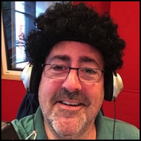 Shane O'Connor wig in a radio studio